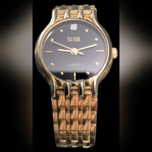 Bill Blass Black and Gold Quartz Timepiece